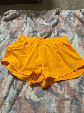 Nike Women’s Neon Orange Running Shorts